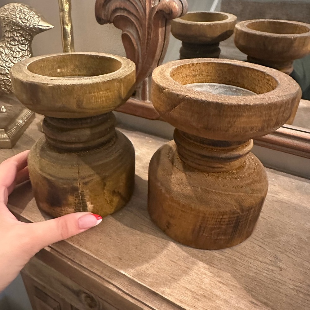 Two wooden candle holders